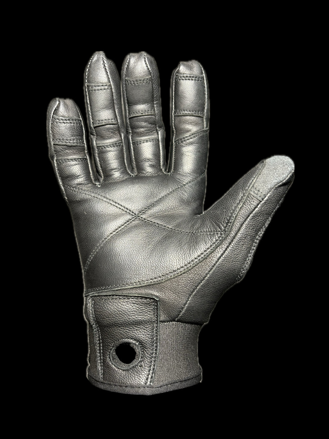 Palm side of black utility glove on a black background