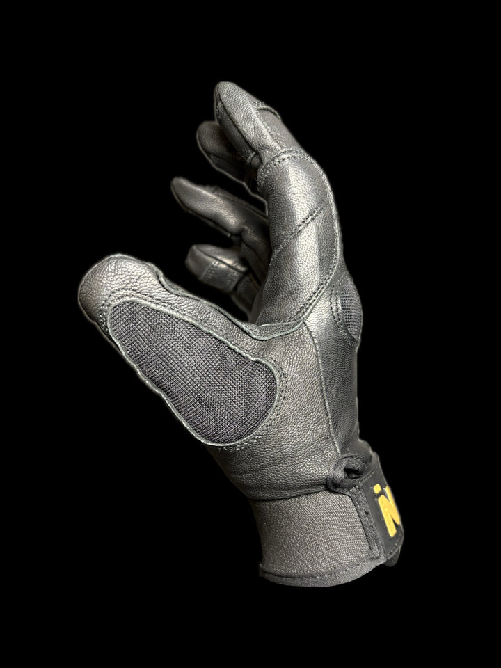 Left side of black utility glove with visible branding on a black background